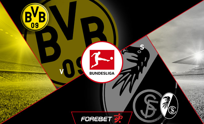 Prolific Dortmund to continue title charge against Freiburg